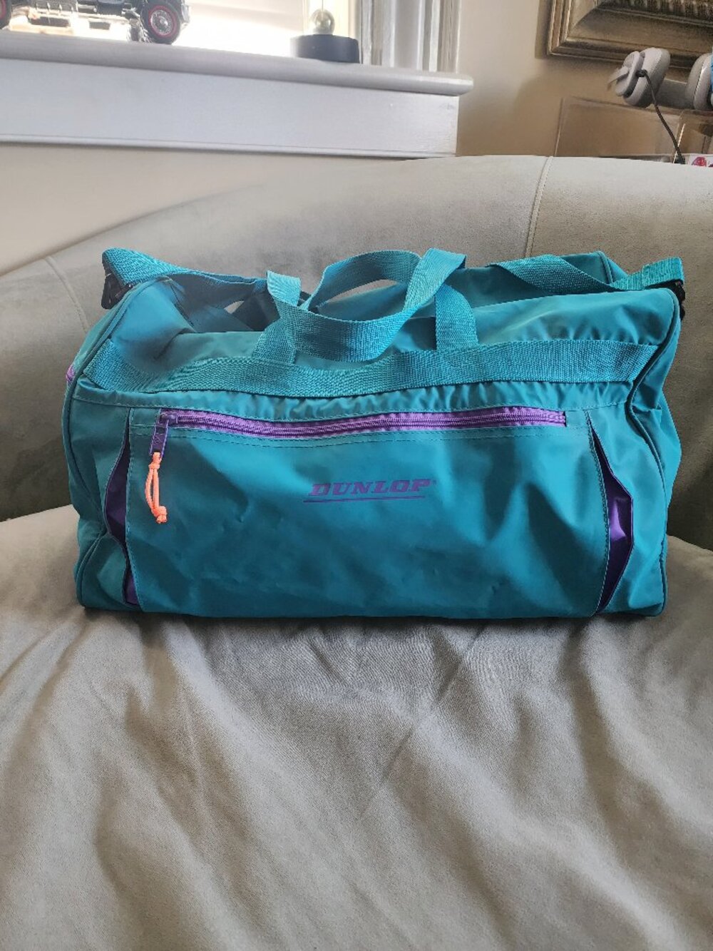 Vintage style Dunlop sports duffel bag in retro teal and purple color